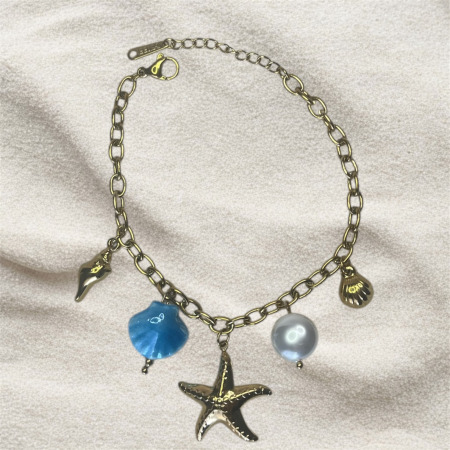 bracelet-acier-inoxydable-etoile-mer-coquillage-bleu-perle-sabbeauty.jpg